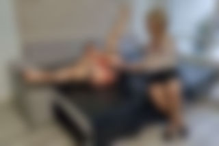 Strap-on cock and stockings are the lesbos' best friends