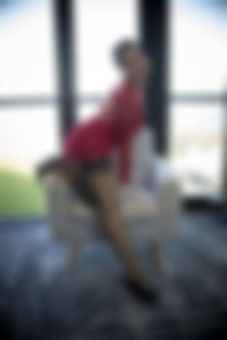 At the seaside in red dress