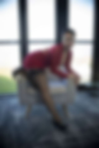 At the seaside in red dress