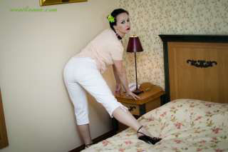 Nylon stockings underneath the vintage trousers.