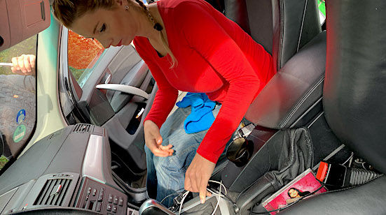 Cleaning Car At Gas Station