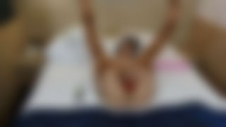 Dildoed and stockinged in the hotel room