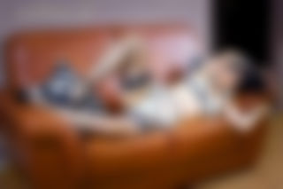 Nylon show on leather couch.