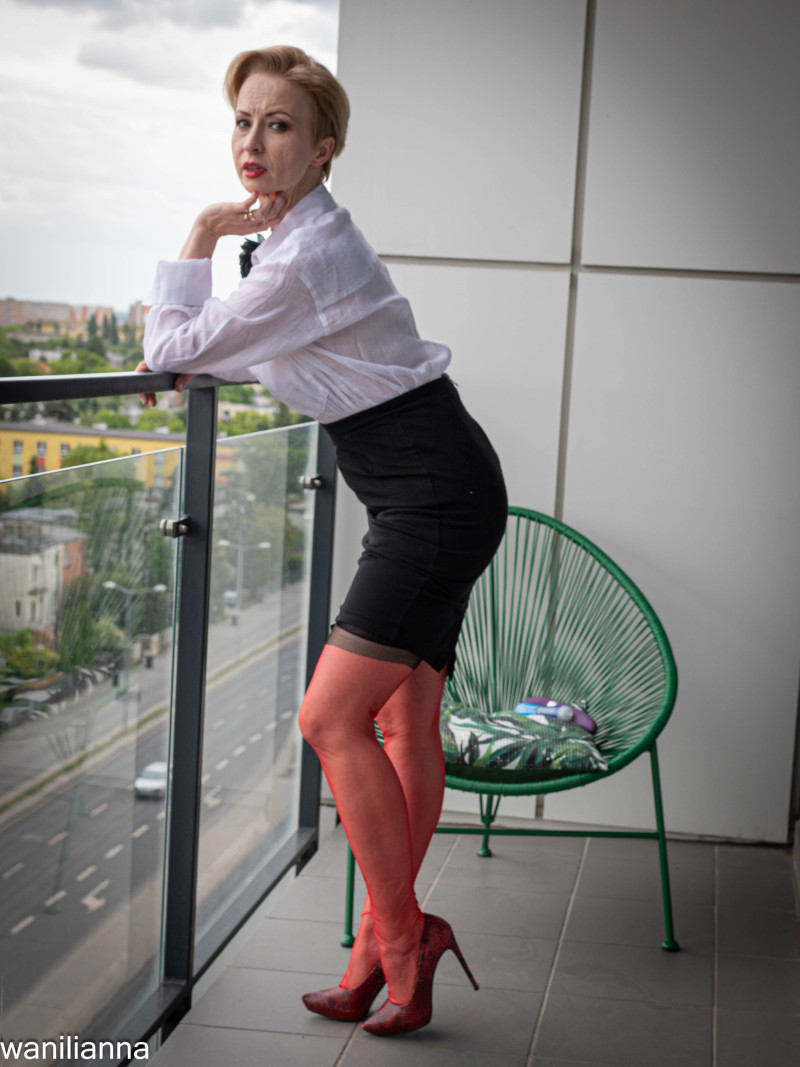 Red nylons on the balcony