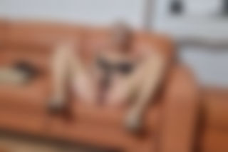 Old leather sofa and genuine nylons