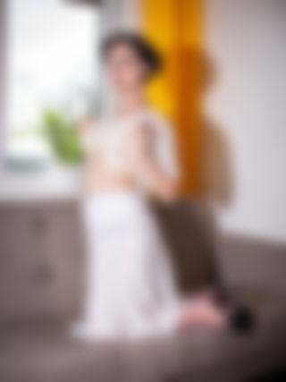 all natural in nylons and pleated skirt