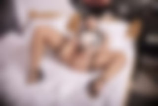 Corsetted lady in stockings