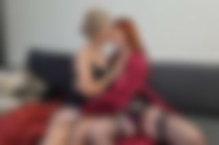 a Blonde meets a girl with auburn hair